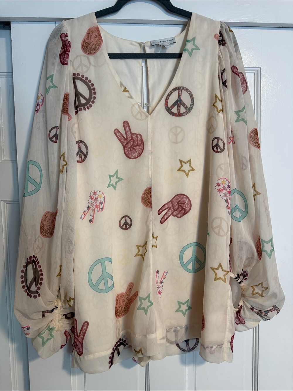 Flowy Cream Peace Sign romper